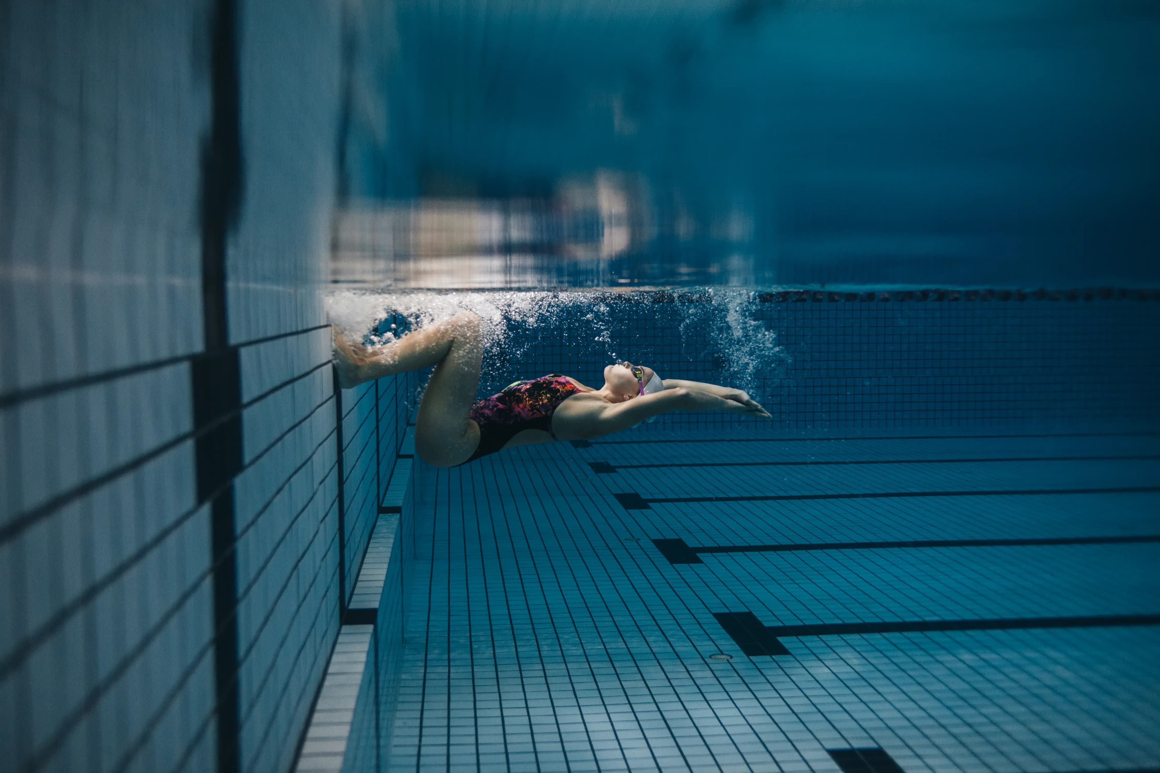 Private swimming lesson at an indoor pool