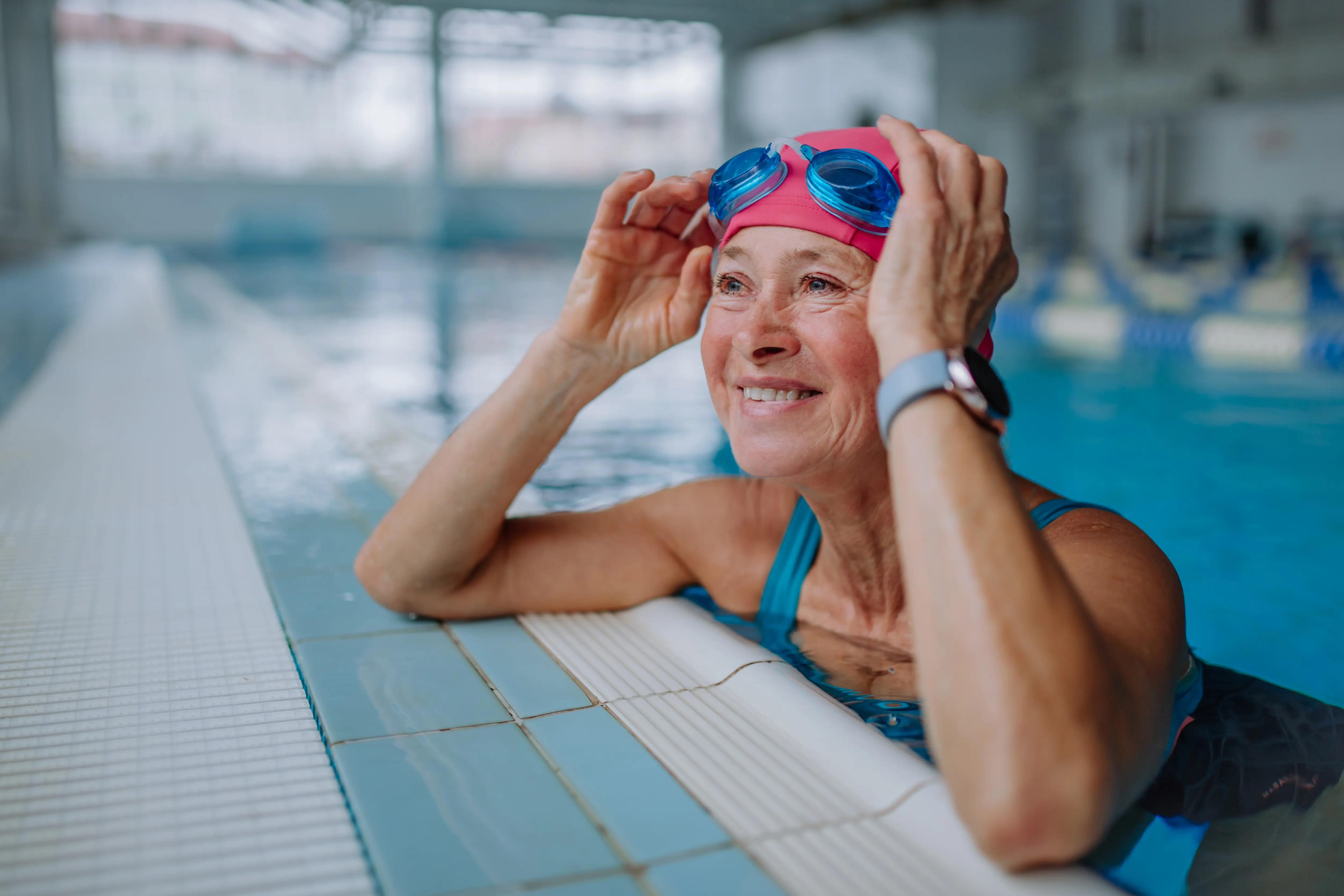Adult swimmer improving technique in the pool